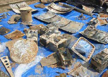 Photo:  Artifacts recovered from inside the aircraft.
