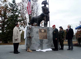 Photo:  Dignitaries dedicating the Captain Lewis and Seaman statues on 30 September. Left to right: Alan Archambault, Director, Fort Lewis Museum;, Brig. Gen. John W. Morgan III, I Corps and FL Deputy Commanding General; Maj. Gen. (Ret.) John Hemphill (AUSA); Col. Debra Lewis, Comdr., Seattle District U.S. Army Corps of Engineers; and the sculptor, Dr. John Jewell.