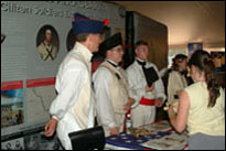 Photo: The National Guard Bureau (NGB) exhibit provided an additional military presence at the Nebraska Lewis and Clark Bicentennial Commemoration, Fort Atkinson Corps of Discovery Festival, in Fort Calhoun, Nebraska, July 31-August 3, 2004.  Traditional National Guard personnel portrayed three military members of the Corps of Discovery and Sacagawea, answered visitor questions.
