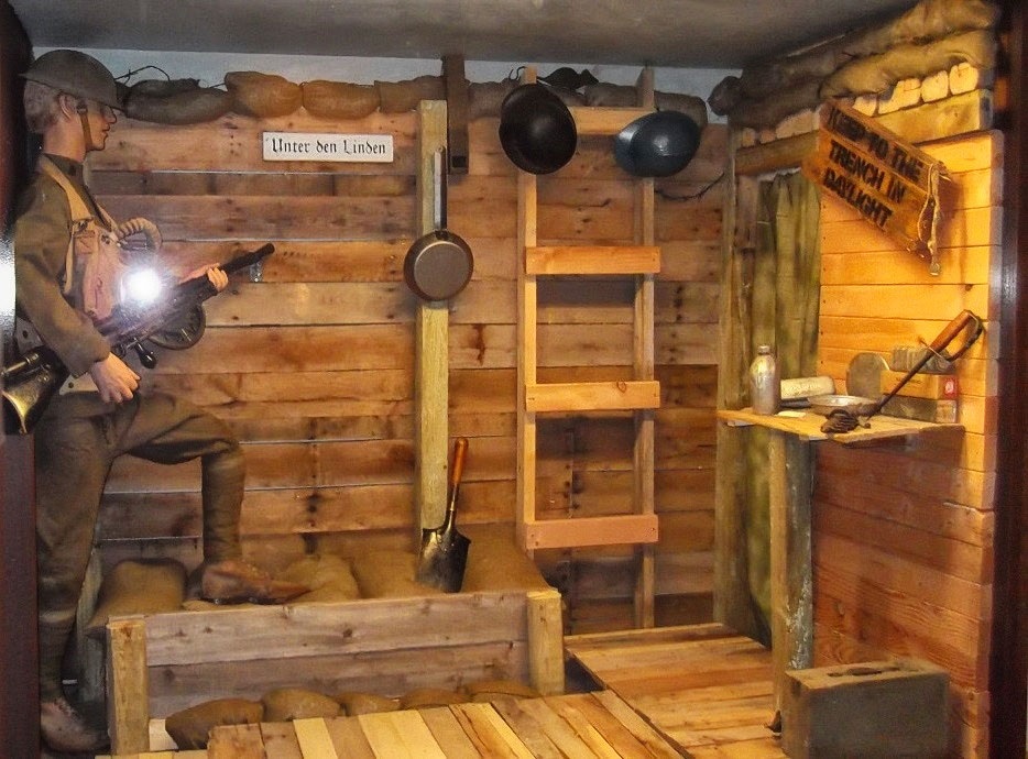 Exhibit featuring a Soldier in a trench inside the Noncommissioned Officer Heritage & Education Center.