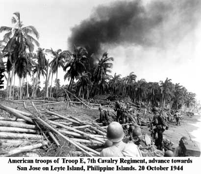 Photo, American troops of Troop E, 7th Cavalry Regiment, advance towards San Jose on Leyte Island, Philippine Islands. 20 October 1944.