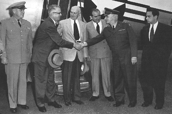 Photo:  General Lawton greets Secretary of the Army Stevens.  Senator McCarthy is on General Lawton's right.  Chief Signal Officer Back is second from left.