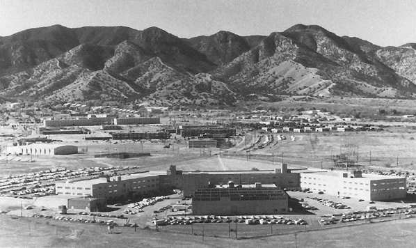 Photo:  Fort Huachuca, Arizona, headquarters of the U.S. Army Information Systems Command.  Greely Hall is in the foreground with the Huachuca Mountains in the distance