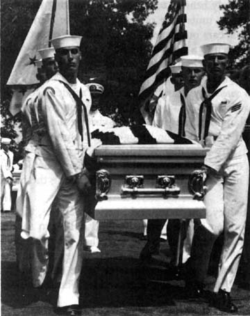 Photo: Navy Body Bearers Carry Casker Of John McNaughton To Grave.