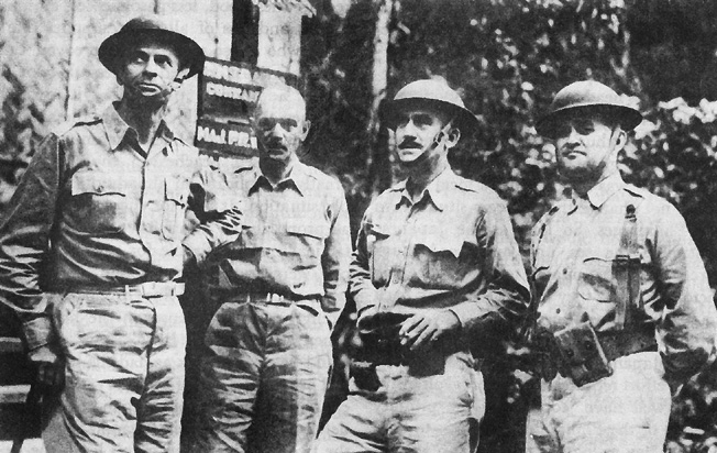 Photo:  USAFFE Headquarters on Bataan, February 1942.  Left to right:  Brig. Gen. Spencer B. Akin, Maj. Paul R. Wing (photographic officer), Lt. Col. Nicoll F. Galbraith, and Brig. Gen. Richard J. Marshall