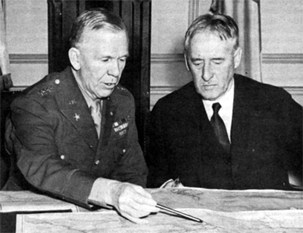 Photo - THE CHIEF OF STAFF AND THE SECRETARY OP WAR. General Marshall conferring with Henry L. Stimson.