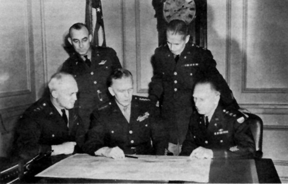 Photo - GENERAL MARSHALL AND WAR DEPARTMENT CHIEFS. Left to right: Lt. Gen. H. H.. Arnold, Maj. Gen. J. T. McNarney, General Marshall, Maj. Gen. B. B. .Somervell, and Lt. Gen. L. J. McNair.