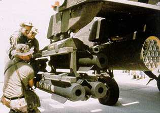 Loading HELLFIRE Missiles on an Apache Helicopter