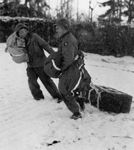 101st Airborne Division soldiers retreiving air-dropped medical supplies near Bastogne.