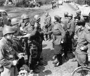 American and Soviet troops meet east of the Elbe River.