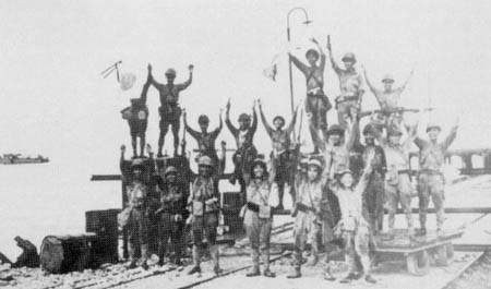 The Japanese 2d Division celebrates landing at Merak, Java, 1 March 1942.