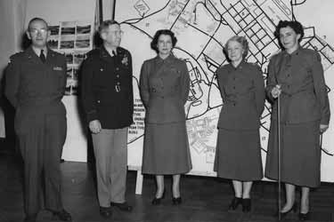  Left to right: Lt. Gen. A.R. Bolling, Commanding General, Third Army; Col. M.E. Halloran, Post Commander; Col. Irene Galloway, WAC Director; Maj. Rebecca Parks, WAC Staff Advisor, Third Army; and Maj. Pat Grant, WAC Liaison at Fort McClellan, 1953. -U.S. Army Women’s Museum