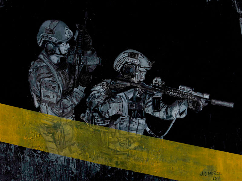 An Army artist drawing/painting.